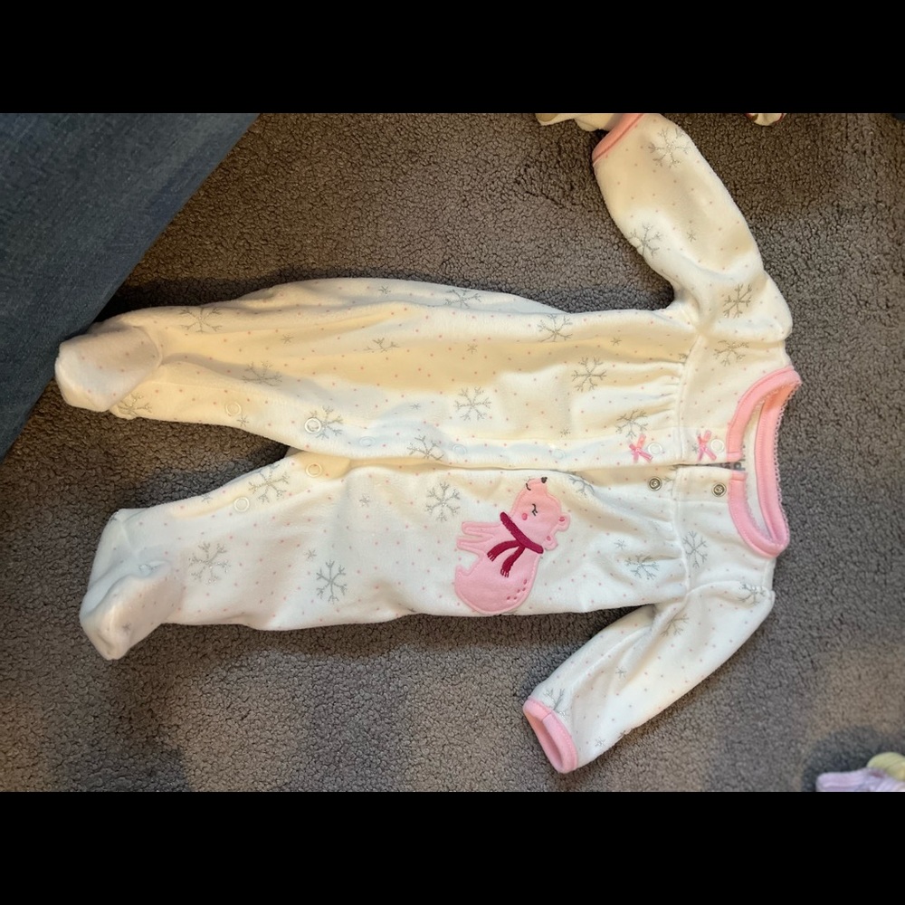 Lot of 3 newborn fleece footie pajamas.